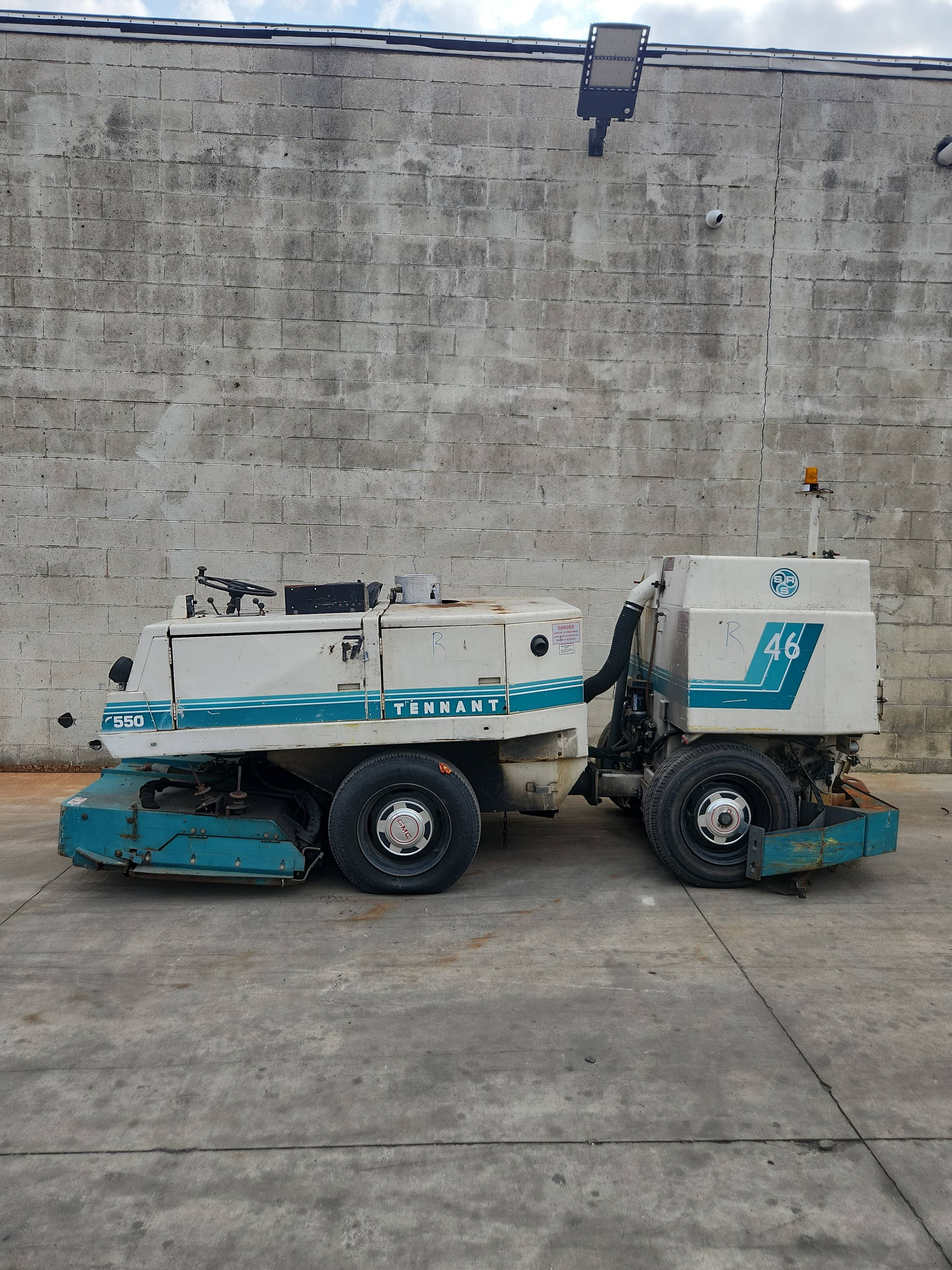 Tennant 550 heavy-duty industrial riding floor scrubber. Hours: 8,504