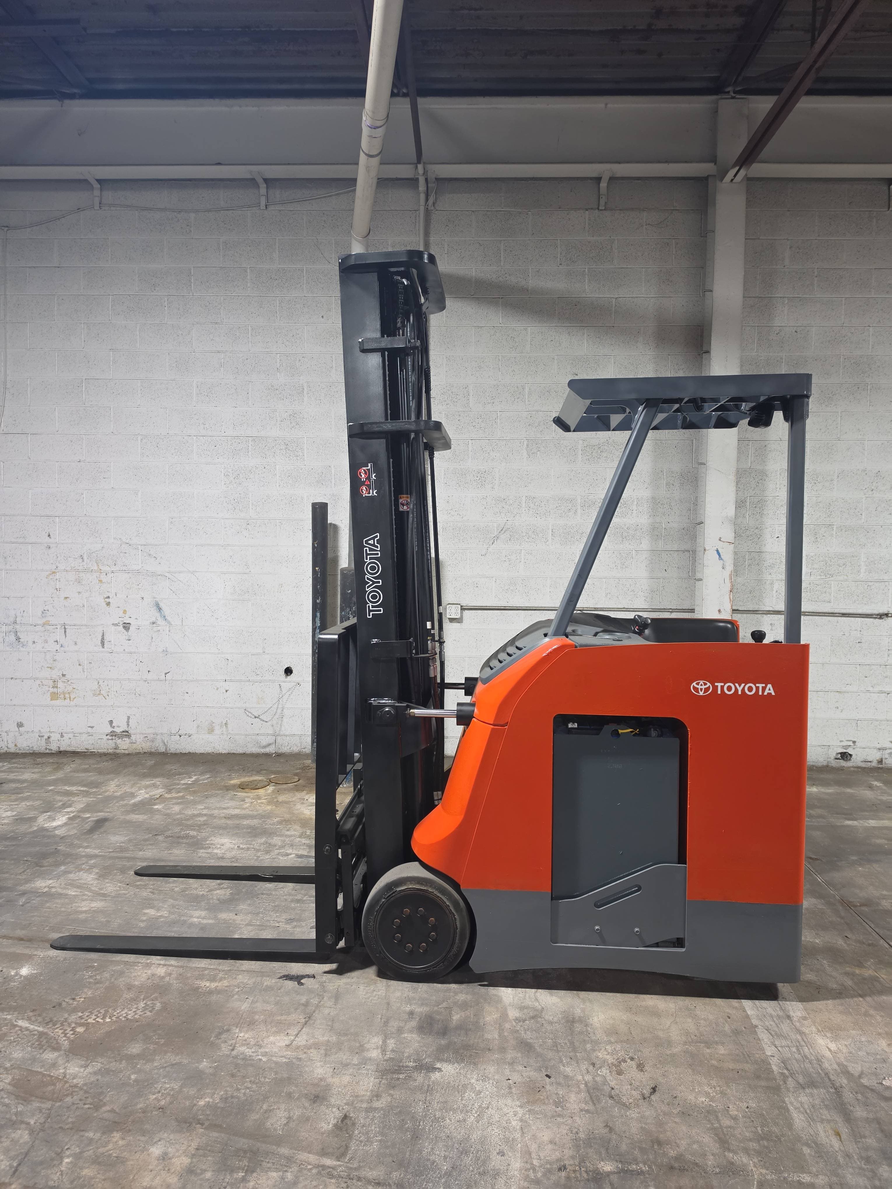 Toyota Model: 8BNCU18 3,500LB Capacity. Stand Up Counterbalance Electric Forklift.
